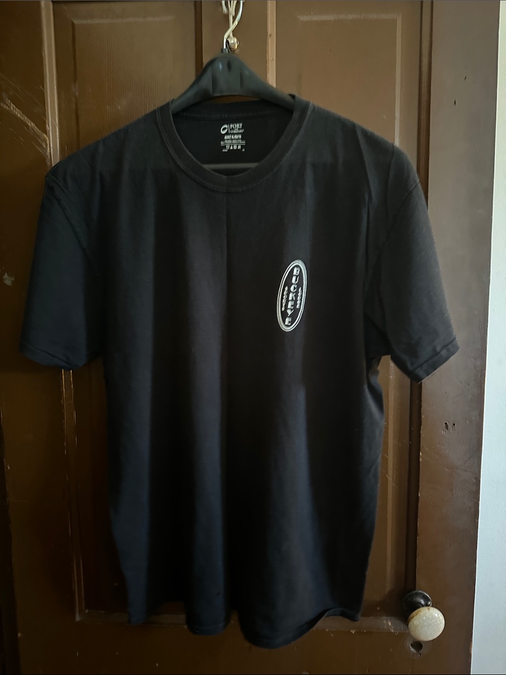 Port and Company Black Short Sleeve Crewneck Tee with White Oval Logo